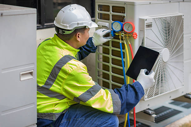 Professional Air Conditioning Repair technician working in Vinemont, AL